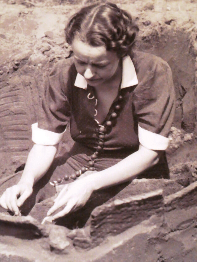 A Dorothy Cross unearthing the NJSM’s large earthen pot on display